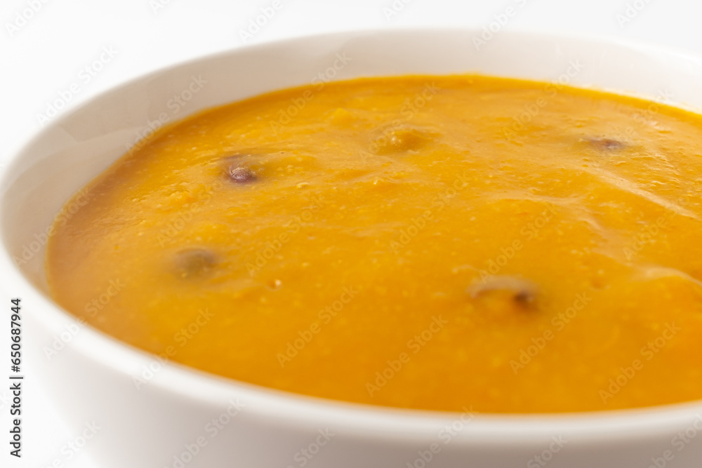 Pumpkin porridge on white background Pumpkin porridge on white background