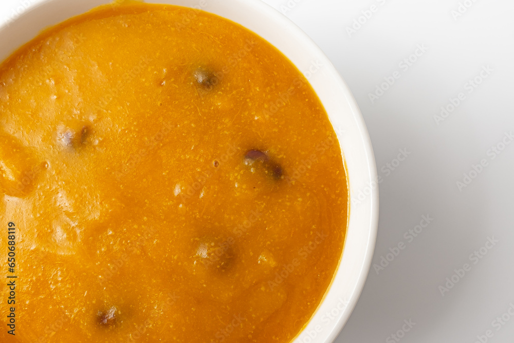 Pumpkin porridge on white background Pumpkin porridge on white background