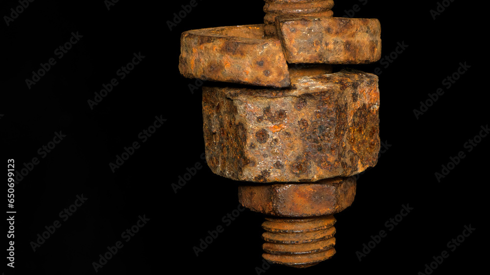 rusty nut. Rusty iron rod with screw threads. Rusted mechanical components. threaded bolt and nut isolated close up. dismantling concept, difficult to unscrew, non-removable. selective focus rusty nut. Rusty iron rod with screw threads. Rusted mechanical components. threaded bolt and nut isolated close up. dismantling concept, difficult to unscrew, non-removable. selective focus