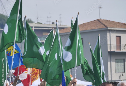 Official flag of Lombardy region exposed during Lega Salvini political rally photo