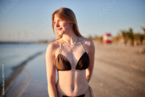 danish girl walking on the beach