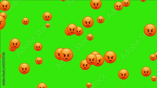 Angry red face. Emoji. Cute falling emoticon isolated on a green background. Animated falling emojis. Social media icons symbol animation with green screen background.