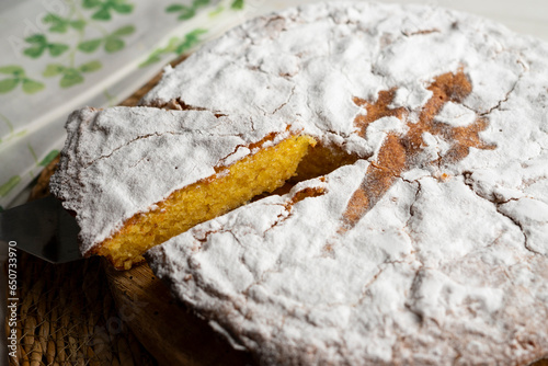 Fototapeta Naklejka Na Ścianę i Meble -  The Tarta de Santiago is the most typical sweet of Galician cuisine and is easily recognized by its emblematic Cross of Santiago in the center.