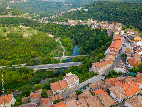 An aerial view of Veliko Tarnovo reveals a Bulgarian city rich in history and culture, with its beautiful buildings, streets, and picturesque hills. photo