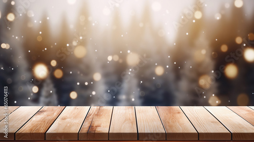 Empty wooden table top with blurred Christmas trees and snowfall with bokeh snow landscape, Christmas holiday background for product display.