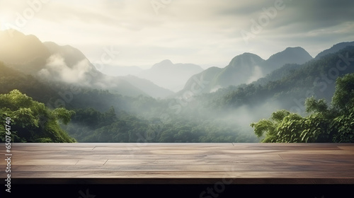 Empty wooden table top with mountain foggy jungle landscape with waterfall. Fog and clouds mountain tropical valley landscape, for display or montage your products.