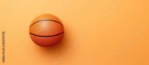 3D rendered gold basketball on isolated pastel background Copy space for team sport