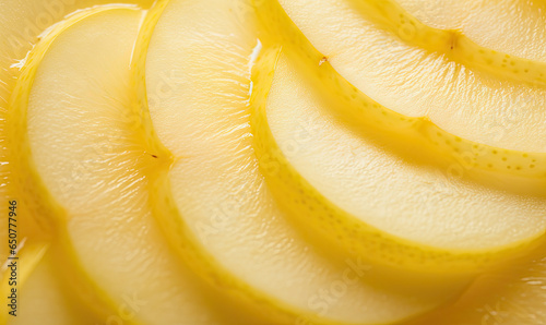 Close-up of vibrant yellow pear slices.