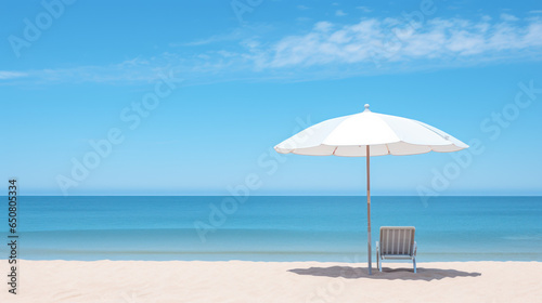 The vast expanse of a serene beach  with a lone umbrella casting its shadow  captures the beauty of less is more.