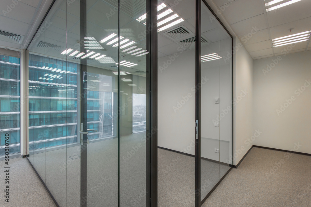 Cubicle office with glass walls and panoramic windows. Cubicle office with glass walls and panoramic windows.