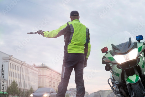 police officer stops a car photo