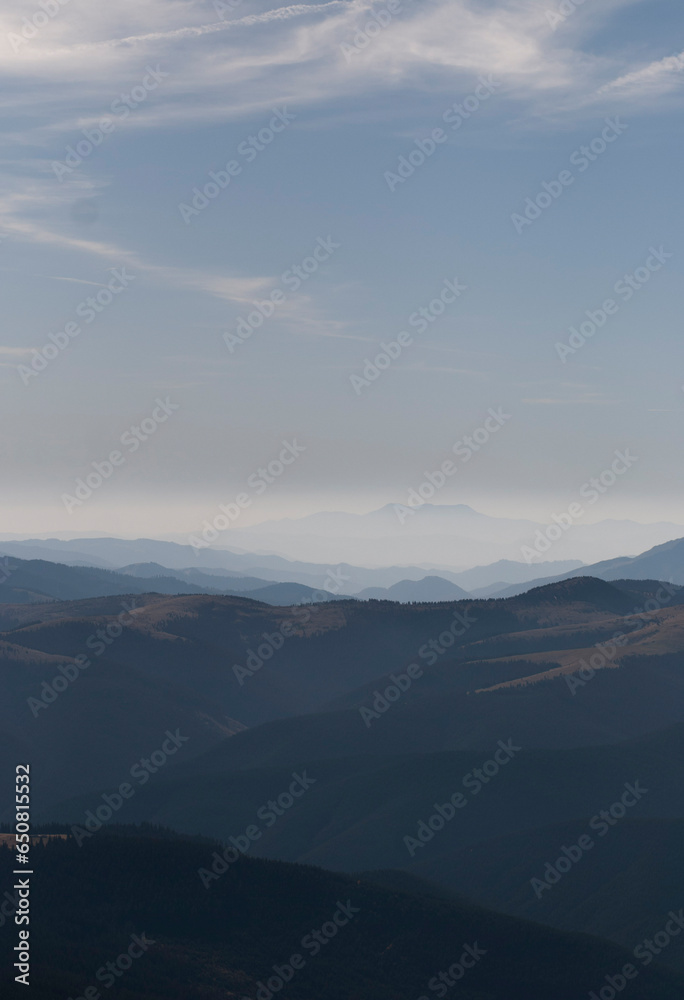 Obraz premium View on mountains under blue sky in autumn in sunny day