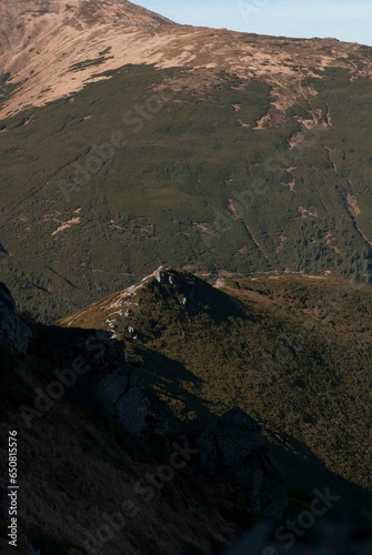 View on mountains in sunlight in autumn photo