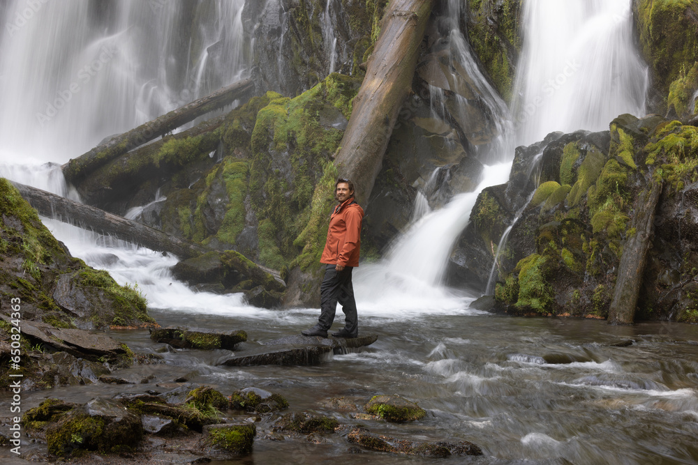 Hiker enjoying the waterfall