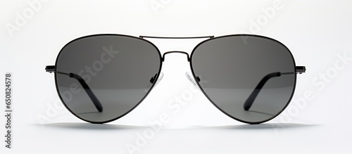 Classic aviator sunglasses with a black silhouette on a white background shown from the front for a summery look