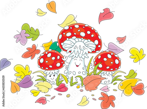 Red fly agarics among grass...