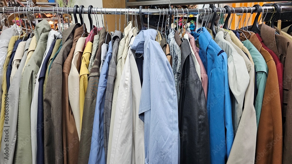 Shirts and coats on the counter of an old things store. Shirts and coats on the counter of an old things store.