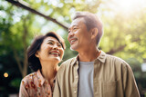 Happy smiling asian mature senior couple posing together 