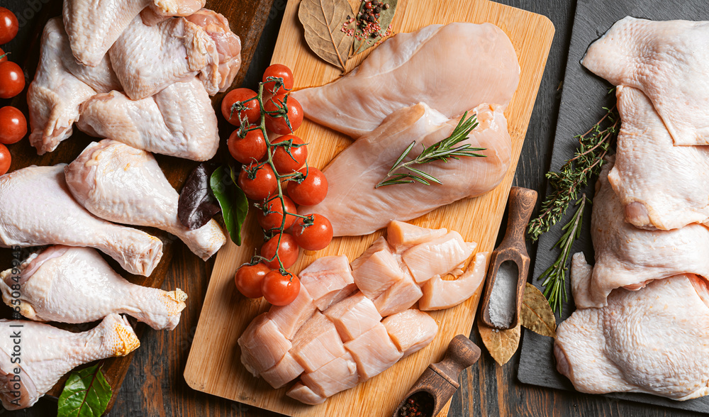 various parts of chicken cut up and ready for cooking