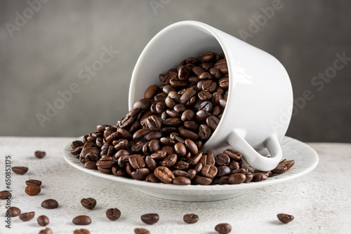 Coffee beans in coffee cup.