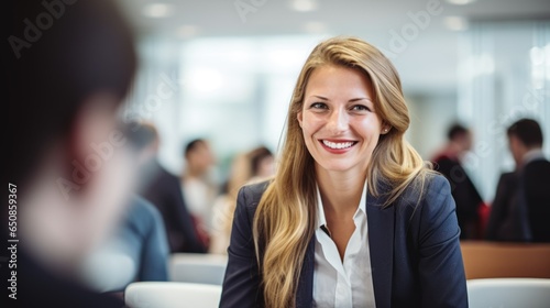 Young fun smiling european successful employee business woman in a suit on the office, happy smiling