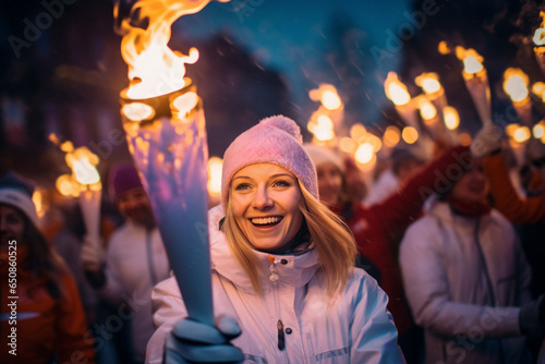 Torch with the Olympic flame at the 2024 Olympic Games. © Elena