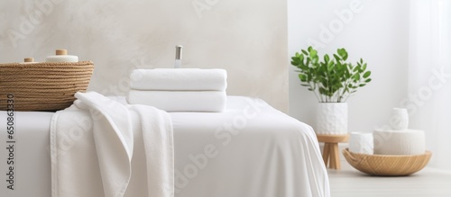 Bedroom interior backdrop featuring white towels © AkuAku