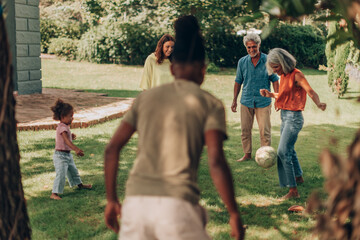 happy multi ethnic family play outside together