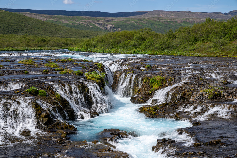 Bruarfoss Waterfall, the teal water along the Golden Circle of Iceland Bruarfoss Waterfall, the teal water along the Golden Circle of Iceland