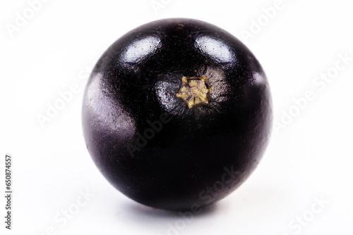 The jabuticaba or jabuticaba is a purplish black-white fruit, typical fruit of Brazil, on isolated white background