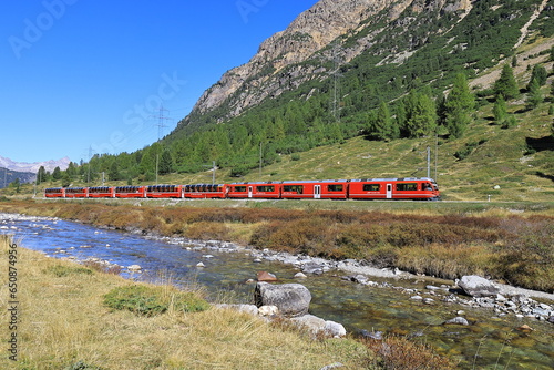 mountains switzerland red train