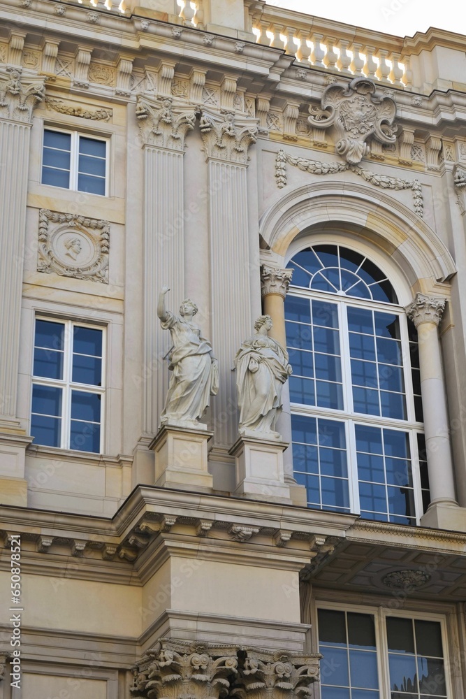 Facade of Berlin Palace adorned with beautiful statues. Germany.