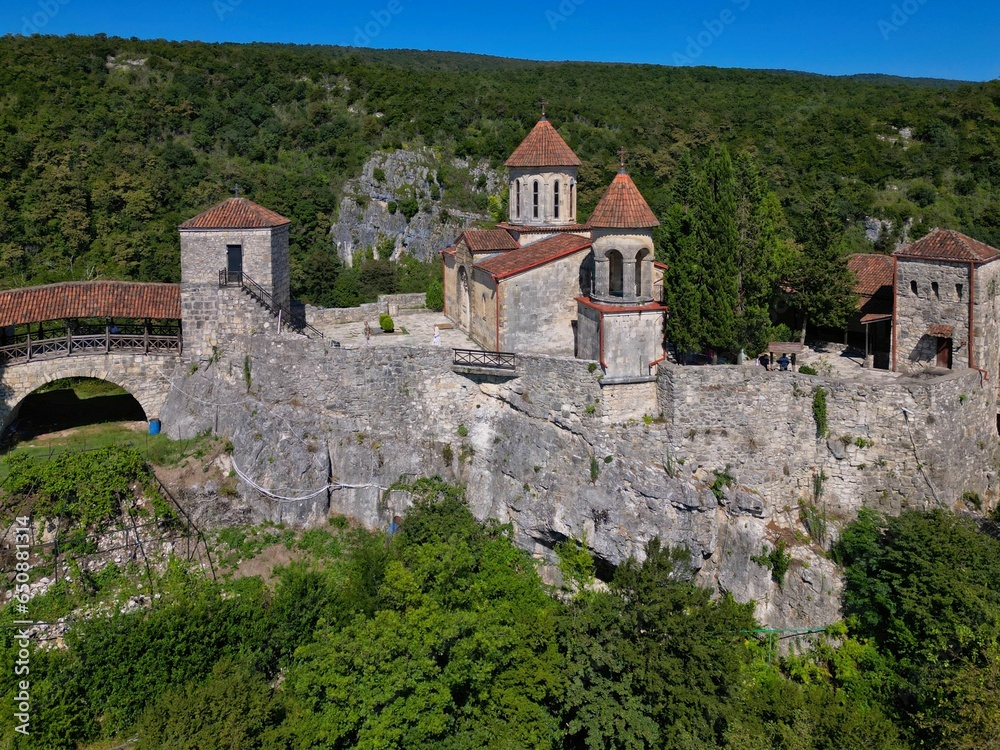 an aerial view of the medieval village in the mountains with some ruins an aerial view of the medieval village in the mountains with some ruins