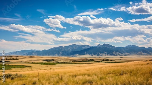 Majestic Bridger Mountains: A Landscape of Nature's Finest Mountains, Hills and Vales with Blue Skies and Clouds, Lush Grasses photo