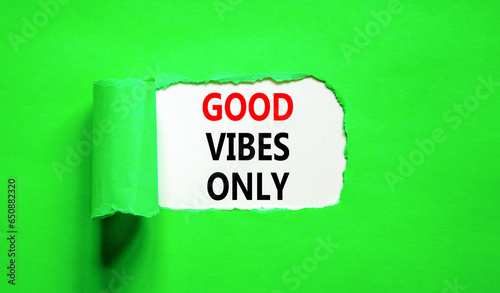 Good vibes only symbol. Concept word Good vibes only on beautiful white paper. Beautiful green table green background. Business motivational good vibes only concept. Copy space.
