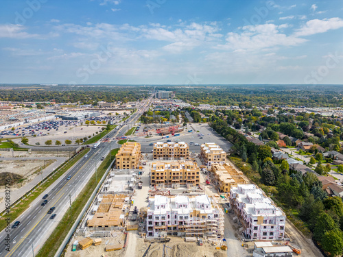 Explore Newmarket's charm in stunning drone photos featuring Davis Dr West, Bathurst St, and Yonge Street. Witness pre-constitution homes and the Ontario Housing Plan in action.