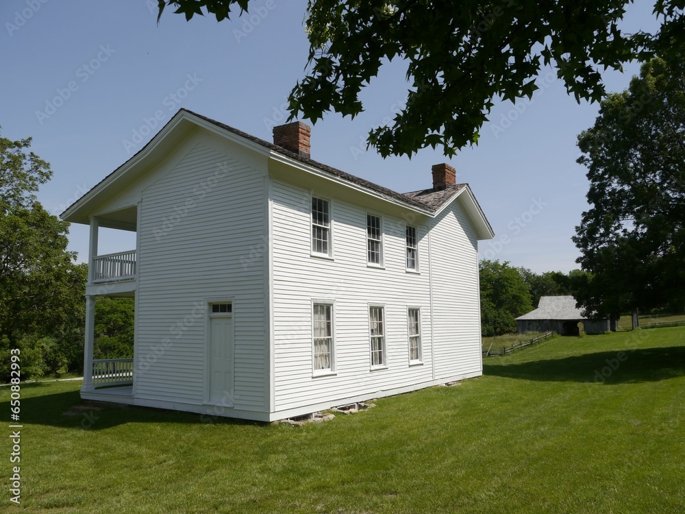Two-story white house at Missouri Town Living History Museum in Lee's Summit, Missouri Two-story white house at Missouri Town Living History Museum in Lee's Summit, Missouri