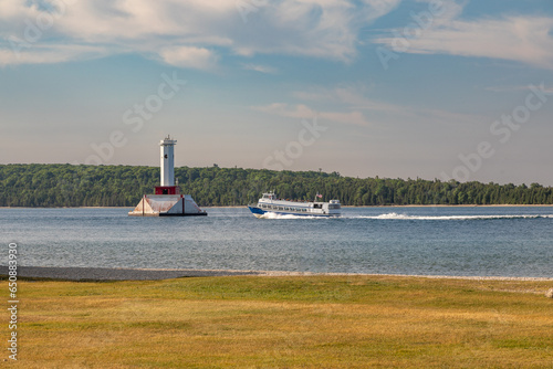 A Ferry Boat Passing the Light House Round Island off Mackinac Island, Lake Michigan 