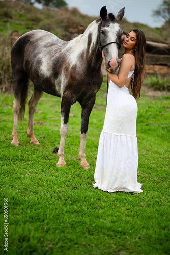 Female model with a horse
