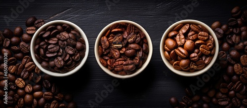 Different types of coffee beans photographed from above on a vintage background