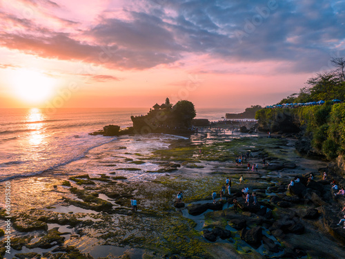Photos Drone view of Tanah Lot and sunset in Bali Indonesia