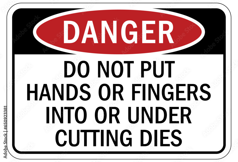 Fototapeta premium Keep hands clear warning sign and labels do not put hands or fingers into or under cutting