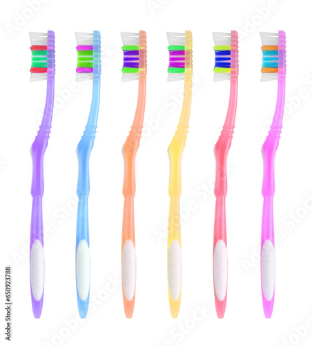 Set of colorful toothbrushes on white background