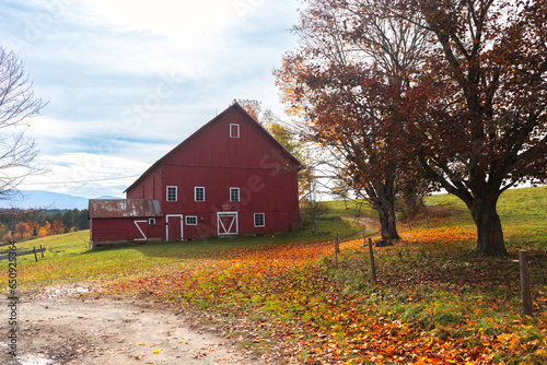 vermont barn in the fall in stowe