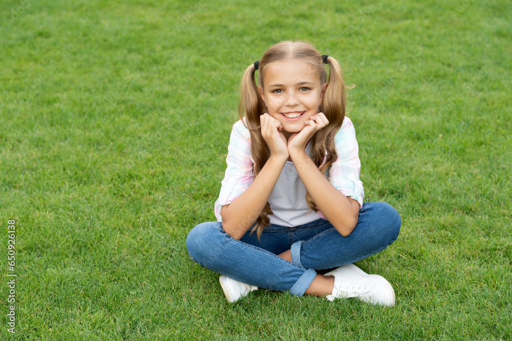 happy childhood of teen girl. summer relax in park. teen girl sitting outdoor. childhood lifestyle of teen. relax on summer lawn. girl relax peacefully on the grass. carefree spirit. copy space happy childhood of teen girl. summer relax in park. teen girl sitting outdoor. childhood lifestyle of teen. relax on summer lawn. girl relax peacefully on the grass. carefree spirit. copy space