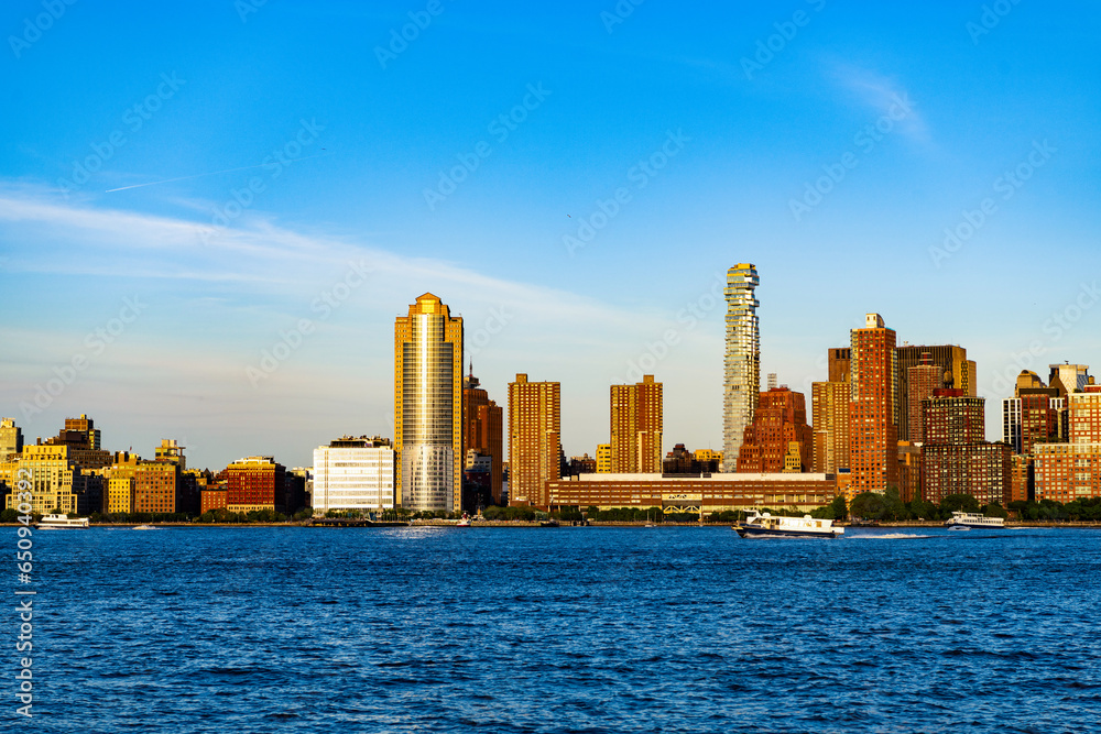 Fototapeta premium manhattan skyline. new york city of america. skyscraper building of nyc. ny city architecture. midtown manhattan at hudson riverside. metropolitan city. cityscape in sunrise. new york downtown