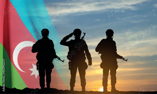 Silhouette of a soldier with Azerbaijan flag against the sunset. EPS10 vector