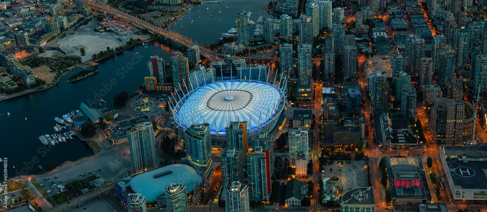 Aerial View of Downtown Vancouver at night after Sunset. British Columbia, Canada