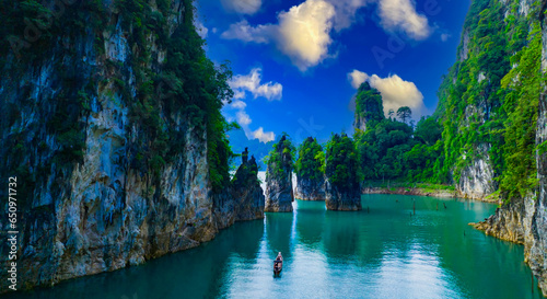 Aerial view at Khao Sok national park Cheow Lan Dam lake with blue sky background  in Surat Thani, Thailand photo