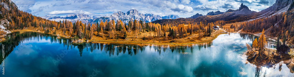 Autumn colors on Lake Federa. Dolomites from above - obrazy, fototapety, plakaty 